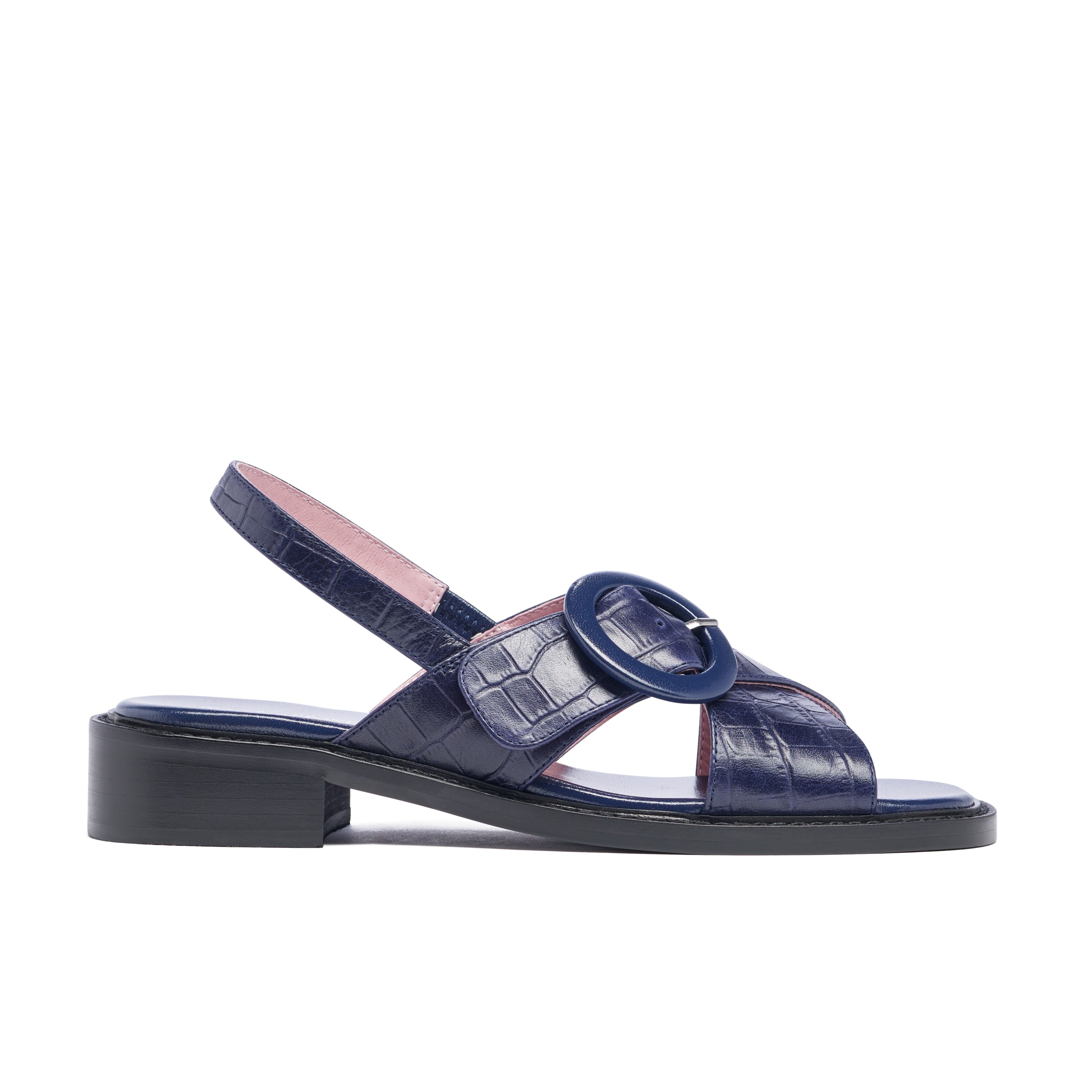 Navy blue sandal with pink interior on a white background