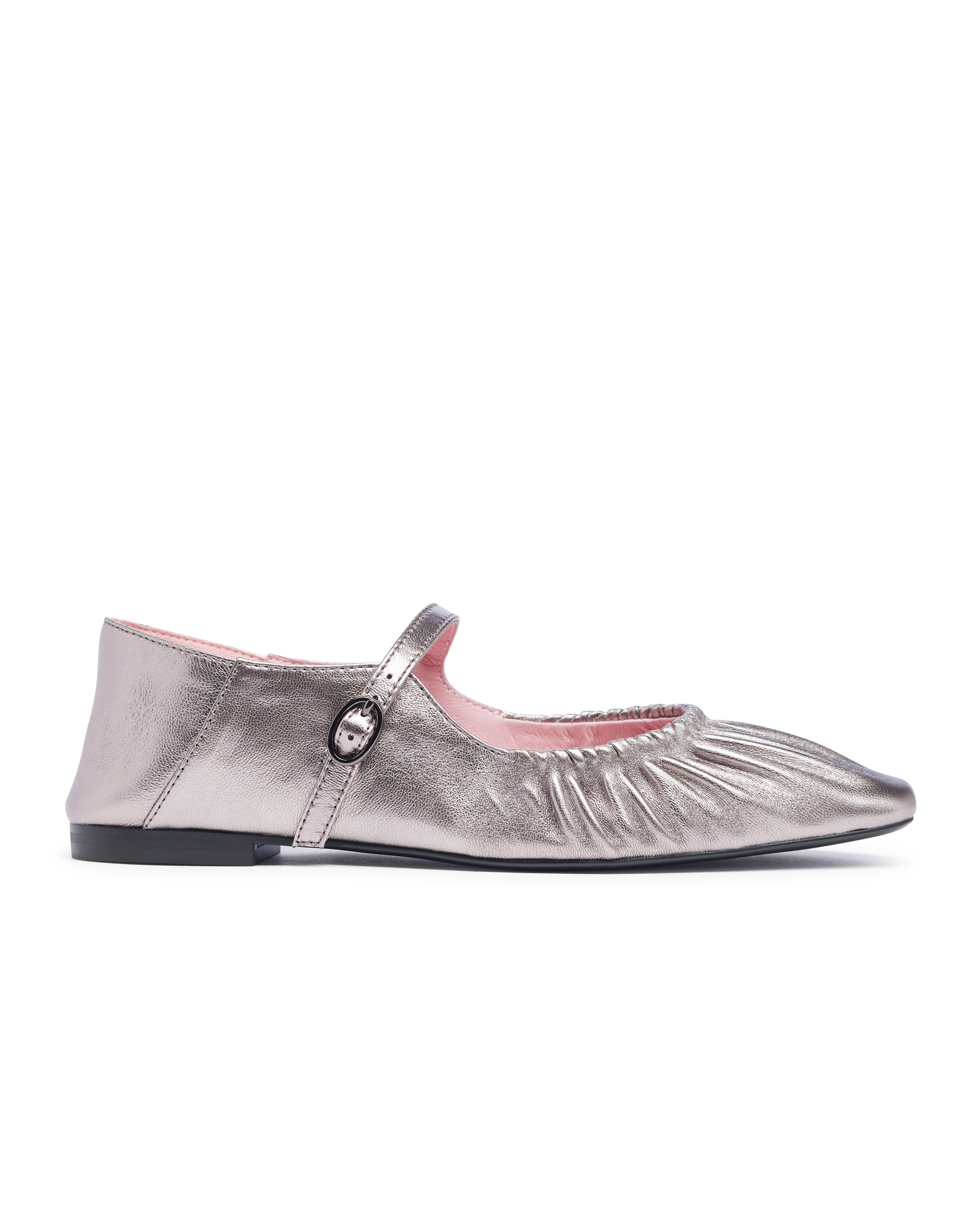 Silver metallic flat shoe on a white background