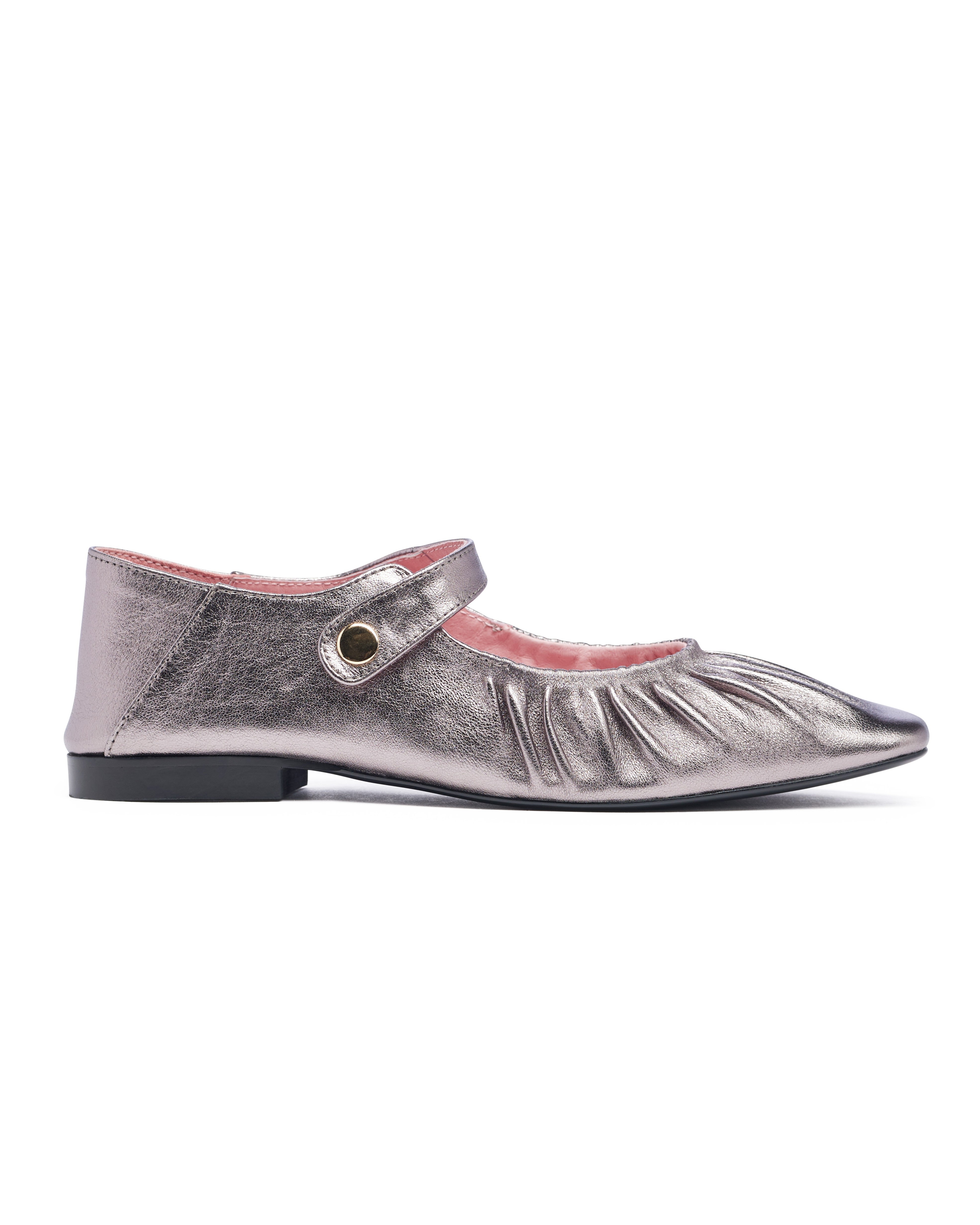 Silver metallic shoes with a small round strap on a white background