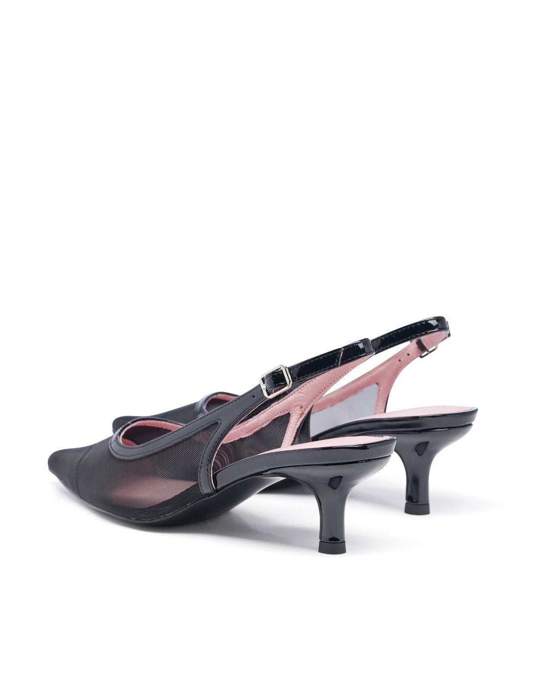 Black high-heeled shoes with pink interior on a white background. Black