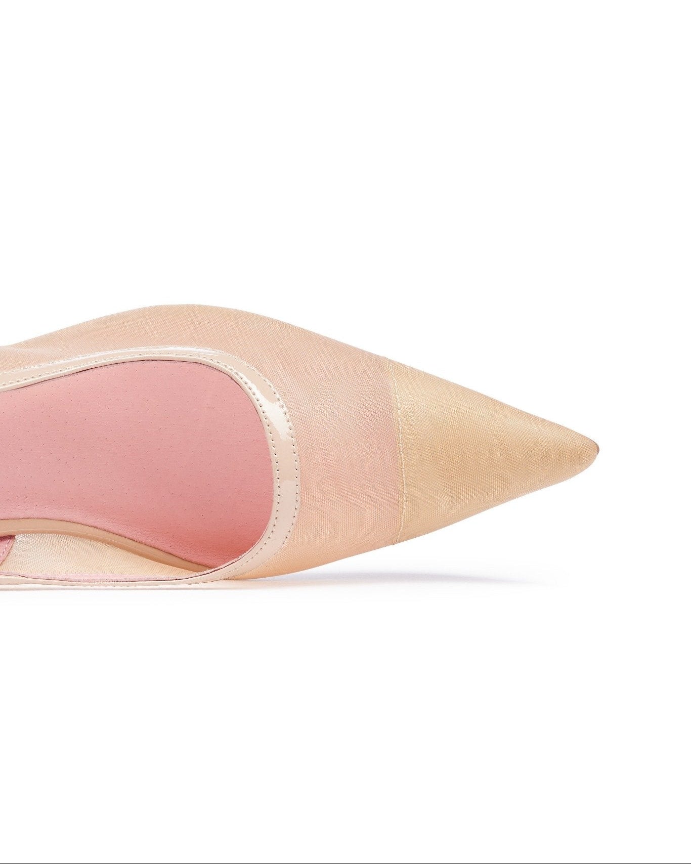 Close-up of a beige high-heeled shoe with a pointed toe on a white background. Nude
