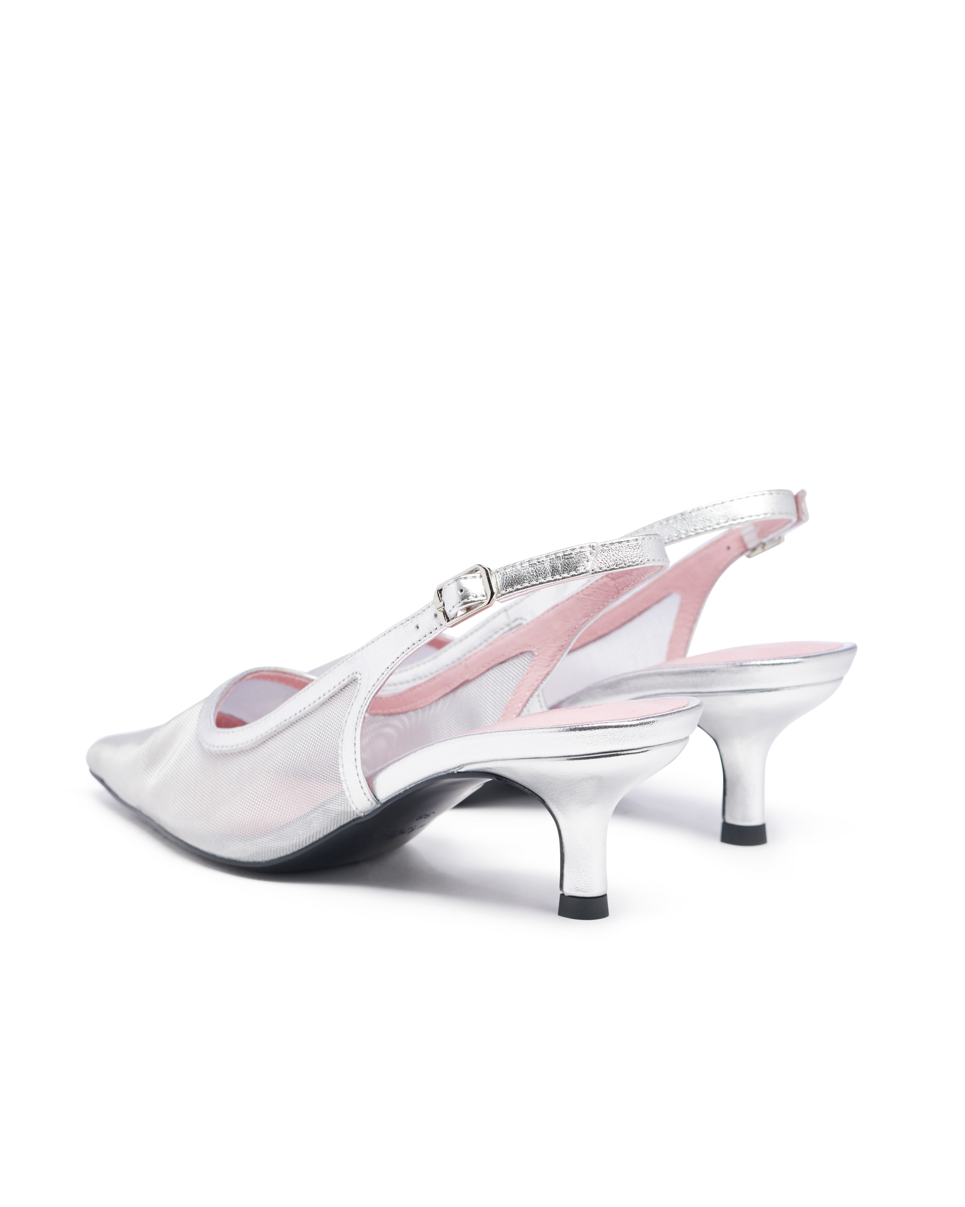 White high-heeled shoe with pink interior on a white background. Tinsel