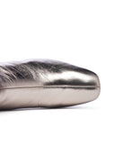 Silver metallic shoe on a white background